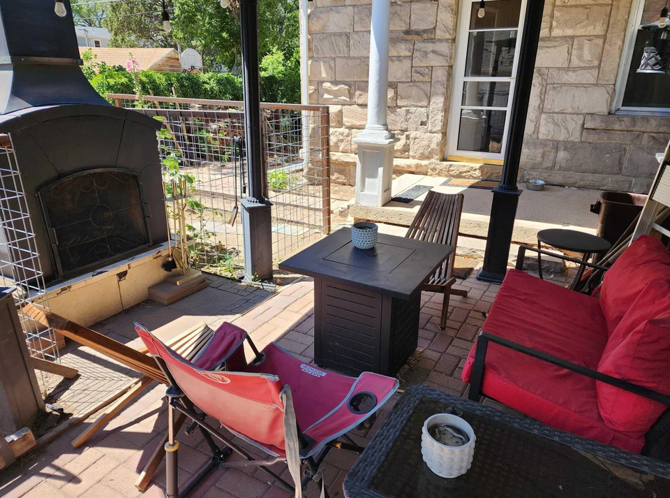Backyard patio and outdoor fireplace